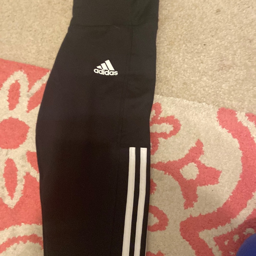 Black and white adidas pants